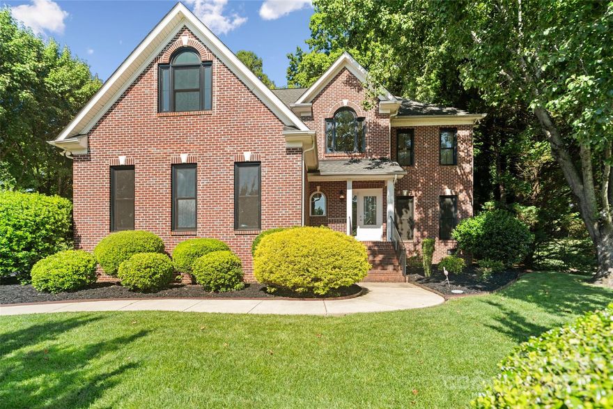 Move-in-ready, full-brick home is located in the heart of Fort Mill! Blending timeless charm with modern updates. Step inside to a stunning two-story entryway that welcomes you into the open floorplan with beautiful hardwood floors. The modern kitchen is a chef’s dream, boasting quartz countertops and a large island perfect for gatherings. Thoughtful updates include a tankless water heater, all-new windows with white interiors and black exteriors, a new back door, and fully paid energy-efficient solar panels. Outside, the home’s curb appeal shines with a fenced-in backyard, extended patio, and drip irrigation in the flower beds. Conveniently located minutes from top-rated schools and easy access to I-77 for Charlotte commuters