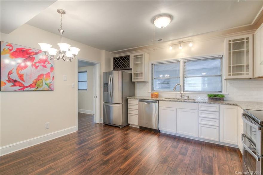 Fabulous renovation in hot Starmount/Montclaire! This charming mid-century home has the updates you've been looking for: gourmet kitchen w/ SS appliances, granite counters, backsplash &wine racks. Beautiful tall windows fill the living room w/ naturallight. A few steps take you down to the great room/kitchen/dining–perfect for entertaining. Gorgeous hardwoods! Updated baths, new light fixtures & paint, fenced backyard, spacious bonus room that’s full of possibilities. NEW HVAC! 1yr warranty!