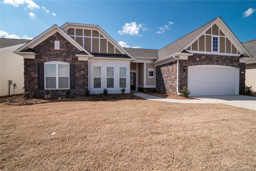 Like New, Open Floor Plan. Generous Fenced Backyard with Screened Porch and Wooded View. Crown Molding, Plantation Shutters, Ceiling Fans Throughout. Entry Hall with Wainscoting and Hardwoods. Gourmet Kitchen with Stainless Steel Appliances, Island, Tile Back-Splash, Ceramic Tile Flooring, Dining Area with Hardwood and Wainscoting. Spacious Great Room with Hardwood and Gas Log Fireplace. Owner’s Suite with Tray Ceiling, Carpet,  Granite Counter-Tops, Ceramic Tile, and Walk-In Closet.