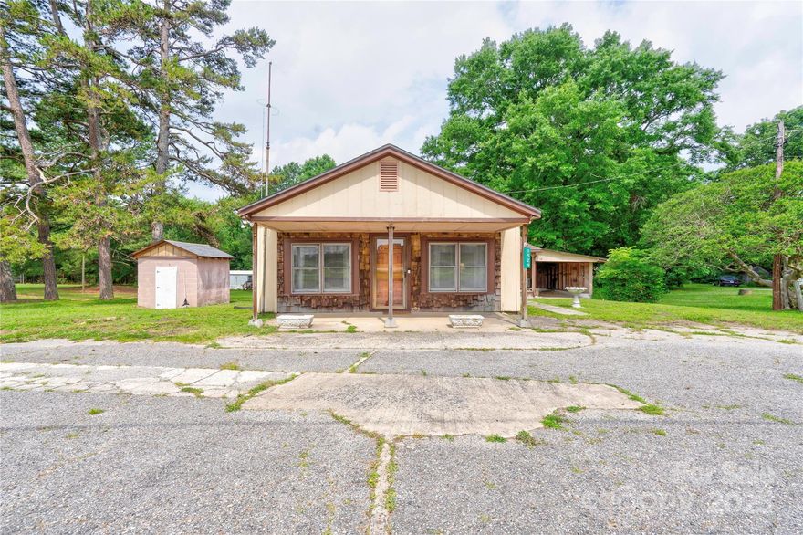 Nestled on 7.11 acres, this property features a 2 Bedroom, 1 Bathroom home along with a 3 Bedroom, 2 Bathroom mobile home. The mobile home is currently rented on a month-to-month basis for $700 per month, providing immediate rental income. Plenty of space & lots of potential! Close proximity to HWY 74 & I-85 making it an easy commute to larger surrounding cities.