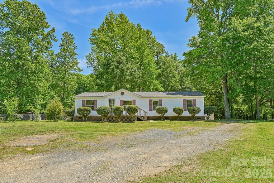 Discover this well-maintained 3-bedroom, 2-bath manufactured home situated on a spacious 1.26-acre lot, just minutes from downtown York. Offering 1,344 square feet of living space, this property provides a great balance of privacy and convenience. The home features a functional layout, a covered carport in the rear for added parking, and a storage shed perfect for tools or extra storage.

Previously used as an investment property, this home comes with a proven rental history, making it an excellent opportunity for investors or buyers seeking a move-in-ready residence with income potential. Enjoy the flexibility of country-style living with easy access to shopping, dining, and local amenities.
