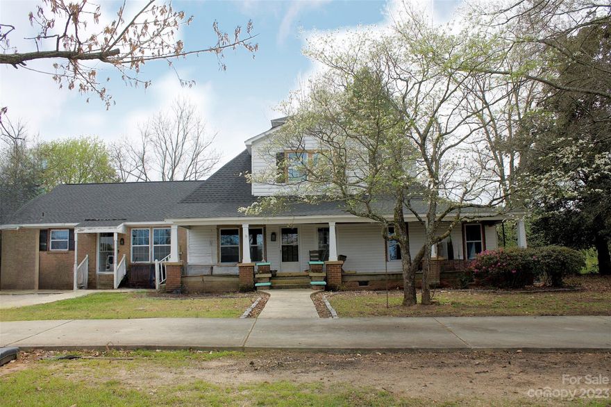 Attention Agents! “As Is”!
This home needs 1/3 of the floor structure redone. Many renovations have been done but others are needed. No FHA, VA, or USDA- Cash or Conventional loans only.  
This farmhouse is so charming and a must-see! It has had updates: a new roof in 2020, new windows (2022), and HVAC (2012) is in good working order. It is located in the country, 15 minutes from the nearest town of Lancaster, SC. 3.75 acres with enough land for a garden and animals. The yard has shade trees for sitting under or enjoying a family picnic! 
All of the rooms are large, warm, and inviting. The kitchen and dining nook are updated with modern appliances. The utility room is beside the kitchen and includes a washer and dryer, a large pantry area with room for a freezer, and an entrance/exit door. The dining room and living room flow beyond the kitchen. There are two bedrooms downstairs, and 1 full bathroom downstairs and two BR and a full bathroom upstairs.