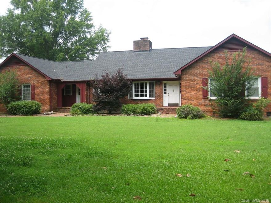 Country living at its best!  All brick ranch on nearly 2.00 private acres featuring 3 bedrooms and 2-1/2 baths. Fireplaces in kitchen and great room. Gorgeous brick floor in foyer.  AC less than one year old and roof is less than 10 years old. Ceiling fans, built-ins, wainscoating, chair rails.  SS appliances, granite countertops and lots of light from bow window in kitchen.  Vacation no further than your back yard.  Beautiful 45 x 18  in-ground pool. New liner.