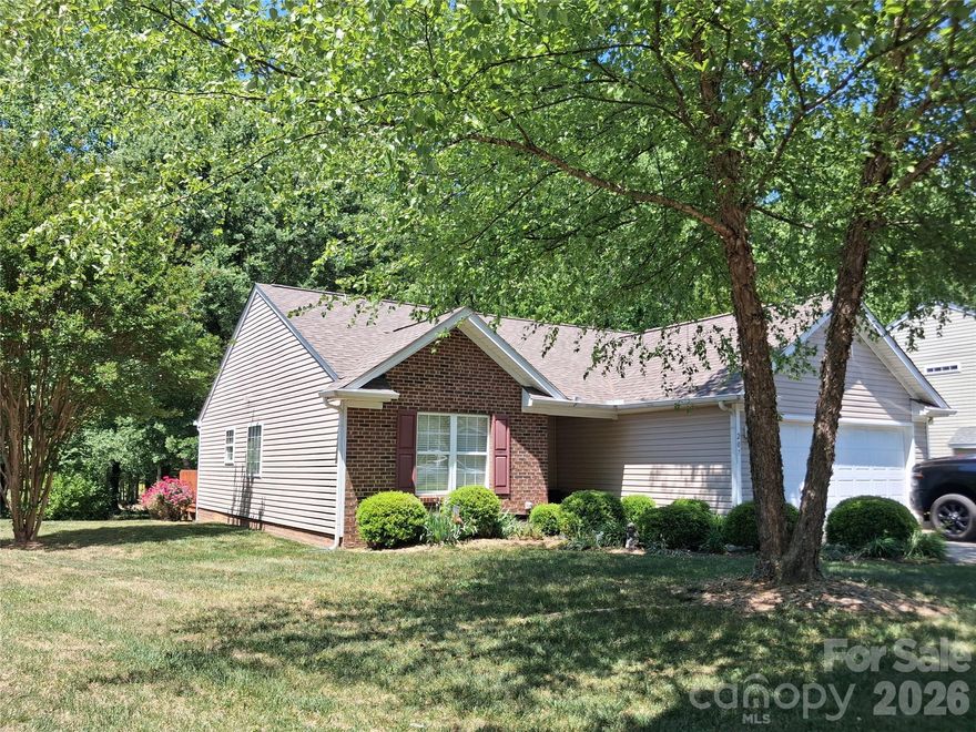 A rare find with a country setting and quick access to many conveniences, this 3-bedroom ranch features a double car garage and backs up to scenic farm pastureland. This well-maintained, one-owner home offers a single-level design with beautiful open spaces and cathedral ceilings. An updated deck with accent lighting provides serene enjoyment of the rear yard. The fully equipped kitchen boasts rich golden oak-grained cabinetry, while the spacious bedrooms include walk-in closets. The HVAC system has been updated and replaced 3 years ago, Roof Replaced 2017, Deck Replaced 2025, LVP Flooring in Kitchen and Dining Replaced about 3 years ago. Conveniently located near major attractions such as the U.S. National Whitewater Center, restaurants, shopping, and grocery stores, with quick access to the I-485 interchange for easy trips to Charlotte Premium Outlets near Lake Wylie and Northlake Mall near Huntersville. The home is also close to modern medical facilities, including the newly established CaroMont Hospital in Belmont and Atrium Health in Mt. Holly.