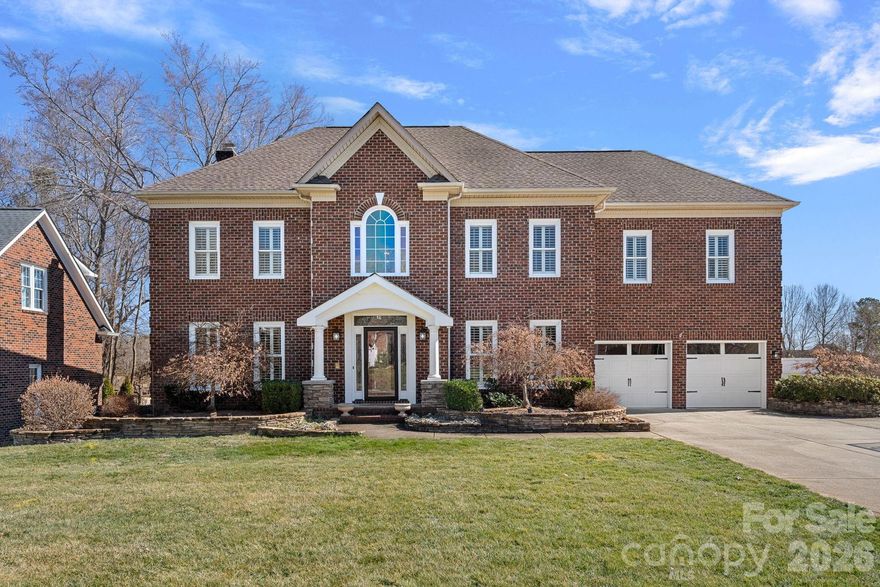 Experience the pinnacle of NorthStone Country Club living in this meticulously updated residence, where every detail reflects thoughtful upgrades and a rare, unobstructed tee-to-green view of the 10th hole awaits. The interior has been completely refreshed including flooring, new windows in 2014, fixtures, and cabinetry throughout, offering a seamless blend of luxury and comfort. 

Designed for the host at heart, the home’s outdoor spaces serve as a true extension of the living area. Relax year-round on the elegant covered back porch that is fully equipped for entertaining and features travertine flooring, a cozy gas fireplace, an outdoor culinary experience boasting a built-in kitchen with a gas grill and storage cabinetry, and a dining area for enjoying outdoor meals. The beautiful and spacious lower travertine patio features a firepit, an elegant water feature, and stone raised beds framed by mature landscaping.

The interior highlights continue with an open floorplan with multiple areas of flex spaces including a Dining Room/Study, Living Room large enough to host a pool table for main level entertaining while enjoying a bright Great Room w/ a gas log fireplace and an abundance of windows to the outdoor living spaces. The modern kitchen is a chef’s dream with high-end Stainless Steel appliances, a custom built in hood over the gas cooktop, extensive amount of custom cabinetry, a large pull-up bar stool island, and an additional built-in cabinet perfect for hosting extra space for meal prep dishes or bar area.

The oversized Primary retreat upstairs boats a large tray ceiling, a sitting area, a private ensuite bath/spa, featuring a steam shower with bench seating, His/Her custom Vanities with granite countertops, and a sprawling walk-in closet professionally outfitted with custom shelving and its own washer/dryer. The second laundry is currently a closet washer/dryer in the office/room which can be made into what HGTV calls a "Laundry Lounge".
Beyond the property line, you are just a short stroll from the premier amenities of the NorthStone Clubhouse, including its top-rated P.B. Dye golf course, resort-style pool complex, and elite tennis facilities.