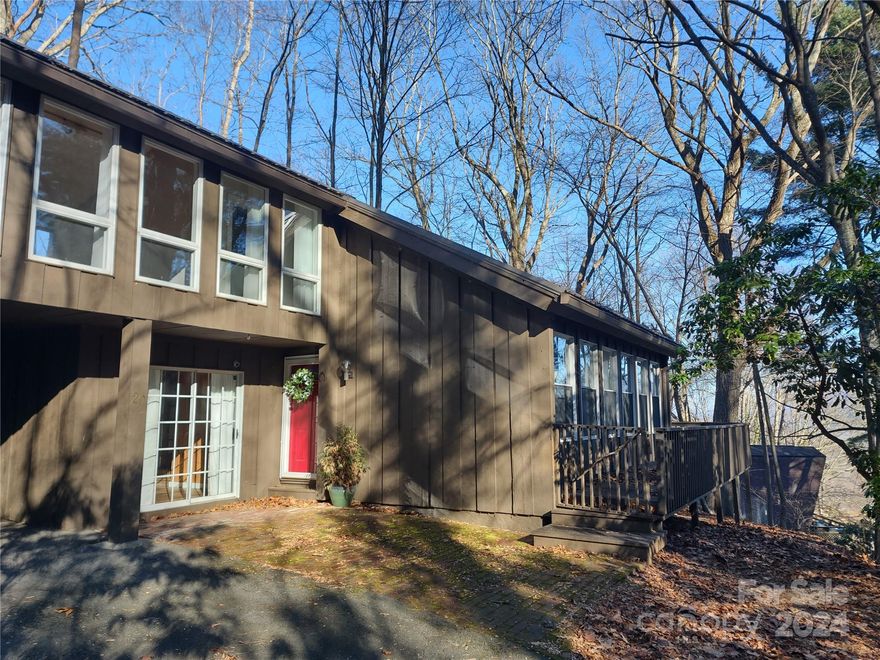 Nestled in the mountains of Western North Carolina is this contemporary-style home with ample living space, upgraded kitchen/bathrooms, and the possibility of a short-term rental. With the Balsam mountain range and the Blue Ridge Parkway so close, you will have an instant hit with guests. There is good paved access, the elevation is a cool 3450' and you have parking for up to 3-4 vehicles. Give this one a second look and check out the possibilities! This is the investment property that you need to take a look at!