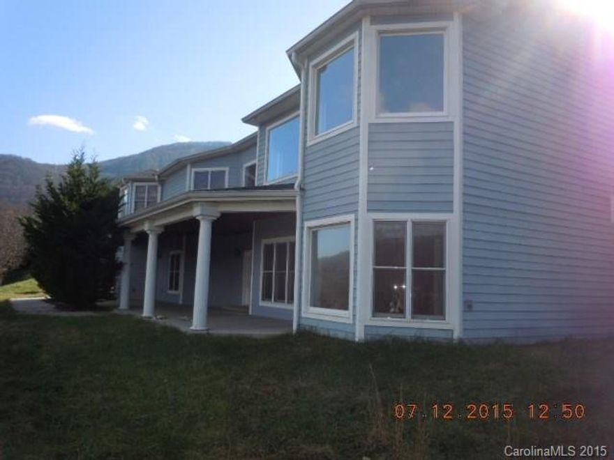 200K below tax!! Almost complete, needs cabinetry, fixtures and heat. Fantastic location with layered views, easy access and mostly private. Grand entry opens to sweeping stairwell, custom tile bathrooms. Sold as-is, details from tax records. Buyer to perform all inspections and due diligence including sq". No warranties expressed or implied. All offers will require addenda, proof of funds.