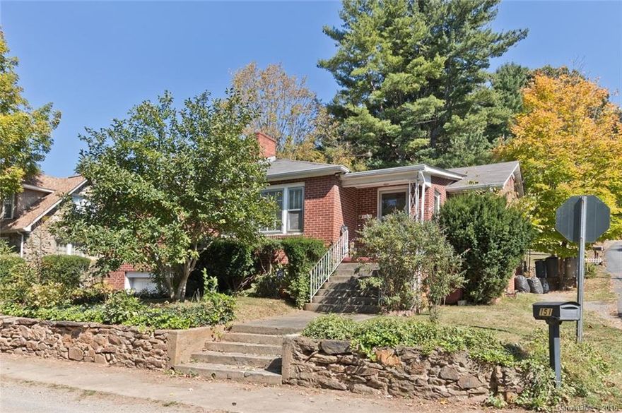 Investor/first-time home buyer alert! Brick rancher is conveniently located 1 block off of Carolina Blvd (not on the flood plain side). Less than 3 minutes to I-40, Great Smoky Mtn Expwy, and Haywood Reg. Medical Center. The house needs work/updating but has great "bones". Open floor plan offers 3 HUGE bedrooms and 2 full baths along with a formal dining room and main level laundry. Use the basement for a garage or storage. Nearly 2,000 SF for this price is a great deal with instant equity!