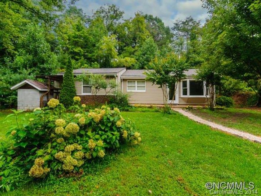 Small cottage on almost 1 Acre with a pond and potential second building site. This home is situated on the left side of the parcel leaving large greenspace for garden or chasing fireflies. Home has 3 Usable sleeping rooms, but access for the third is through 2nd, and has no closet. Hard to find combination of usable greenspace and home at this price point, we encourage a visit and welcome you to spend some time by the pond and small waterfall.