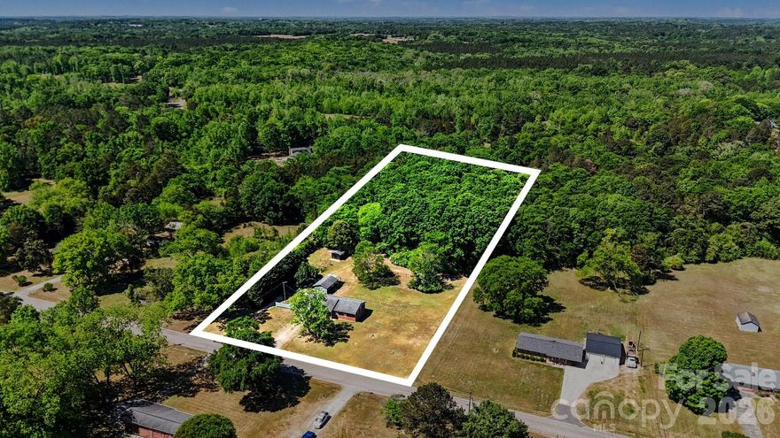 Are you searching for a home on a large functional lot (+/-2.75 acres) with NO HOA, a separate garage with electric, gas and water plus an additional storage building? Then don’t miss this classic 3 bed/1.5 bath all-brick ranch offering functional indoor space and all the outdoor space that one can need. 

The open over-sized living area flows naturally into the kitchen, creating a comfortable and functional layout ideal for everyday living and entertaining. The home is move-in ready so come with a vision on how to make it your own. Please note there are hardwood floors under the carpet. 

Outside is where this property truly shines. With over 2.75 acres, the expansive backyard offers an incredible amount of open space framed by mature trees for natural privacy. A wired and heated 16x24 shop is perfect for hobbyists, mechanics, or anyone needing a dedicated workspace. A secondary storage building offers the versatility for a she-shed, equipment, or recreational gear. Situated within easy reach of both Chester and Rock Hill, this property offers a peaceful retreat without sacrificing convenience.