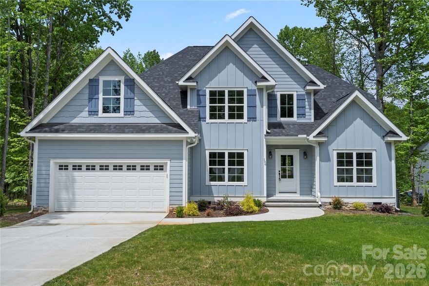 Beautiful custom new build home in Mooresville's established Autumn Grove community. Previous builder model home. Private 0.6 acre lot overlooking lush trees & forestry, w/ample cleared space that will accommodate a pool, or additional storage out building! Upgraded interior features include hard floors throughout (no carpet,) vaulted ceilings, crown molding, stone fireplace, leathered countertops, modern lighting, & tile showers! Master en-suite on main floor w/ tray ceiling, two walk-in closets, double vanities, custom glass shower, & deep soaking tub under a vaulted ceiling! Formal dining room, breakfast room, and main floor office with connecting en-suite full bath, and nice size closet! Vaulted ceiling great room w/ stone fireplace, & large windows overlooking the private back yard. Upstairs level boasts two additional generous sized bedrooms, each w/ large closets, & en-suite Jack-&-Jill bathroom. Upper level becomes complete w/ a large additional bonus room! 1Y builder's home warranty included!