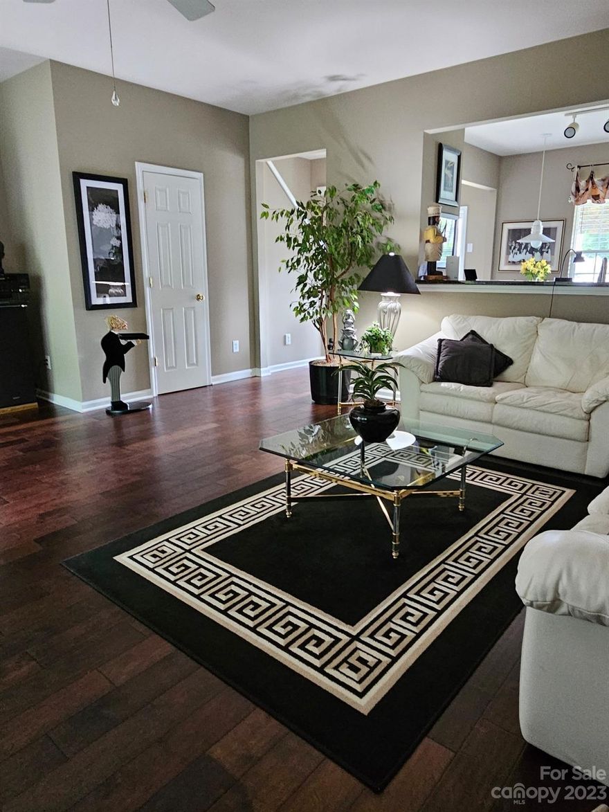 Beautifully maintained 3 BR 2.5 BA townhome in sought after Willowmere.  This original owner has maticulously taken care of this wonderful home.  The kitchen has granite countertops and tiled floor and the remaining downstairs has dark hardwood flooring.  The spacious primary bedroom has a walk in closet and dual vanities in the bathroom.  Enjoy the view and privacy of the patio. Accessed via dual sliding glass doors. New windows were installed on the back of the home 3 years ago.  Willowmere is an amenity rich neighborhood with four tennis courts, pool, club house and playground.  Also, shopping and dining are within walking distance.