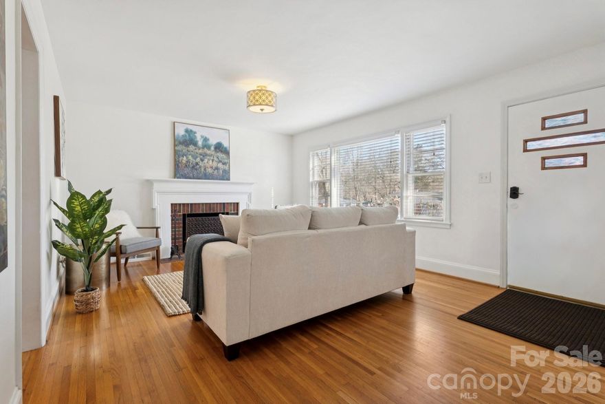 Welcome home to your beautiful, spacious, well maintained ranch in Eastway Park - one of Charlotte’s most desirable and conveniently located neighborhoods experiencing exciting growth with No HOA. Whether you’re looking for your first home, your next move, or a long/short-term rental investment, this property delivers. Situated on a generous .27-acre lot with a fenced, flat backyard, the home welcomes you with abundant natural light, gleaming hardwood floors, and an inviting living room anchored by a cozy fireplace. The beautifully remodeled Cook’s Kitchen is a centerpiece of the home, featuring leather-finished granite countertops, timeless shaker cabinetry, slate appliances, and a large island with seating that flows seamlessly into the dining area - perfect for everyday living and entertaining. The expansive primary suite is a true retreat with a vaulted ceiling, two large closets, a private ensuite bath, a bonus flex area ideal for a reading nook or yoga space, and direct access to the screened-in porch. A dedicated laundry room provides added convenience with a newer utility sink and extra storage. You'll love the high-value upgrades, including solar panels with a transferable warranty, an EV charger, tankless water heater, new HVAC system, encapsulated crawl space, enhanced attic insulation with a tent hood, a multi-car driveway, and an outdoor storage shed. Enjoy the unbeatable location with prime access to Independence/74, Interstates, Evergreen Nature Preserve, UNCC, and the best shopping and restaurants in Uptown, NoDa, Plaza Midwood, and Cotswold. Don’t miss this exceptional blend of MCM charm and modern updates!