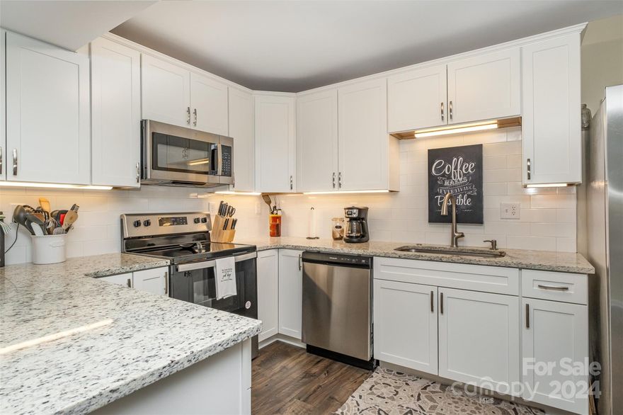 Incredible updated all brick townhome in Olde Georgetowne! Three bed, two and a half bath with two separate living areas and a dedicated dining room. NEW LVP Flooring, Soft Close White shaker cabinets, stainless steel appliances, granite countertops all done in 2023! All three bedrooms upstairs with ceiling fans in each, a primary suite with two closet spaces and an ensuite bathroom. Ample storage with more space below the stairs and an outside storage closet. Private entryway with front patio and you will love the large private back patio!