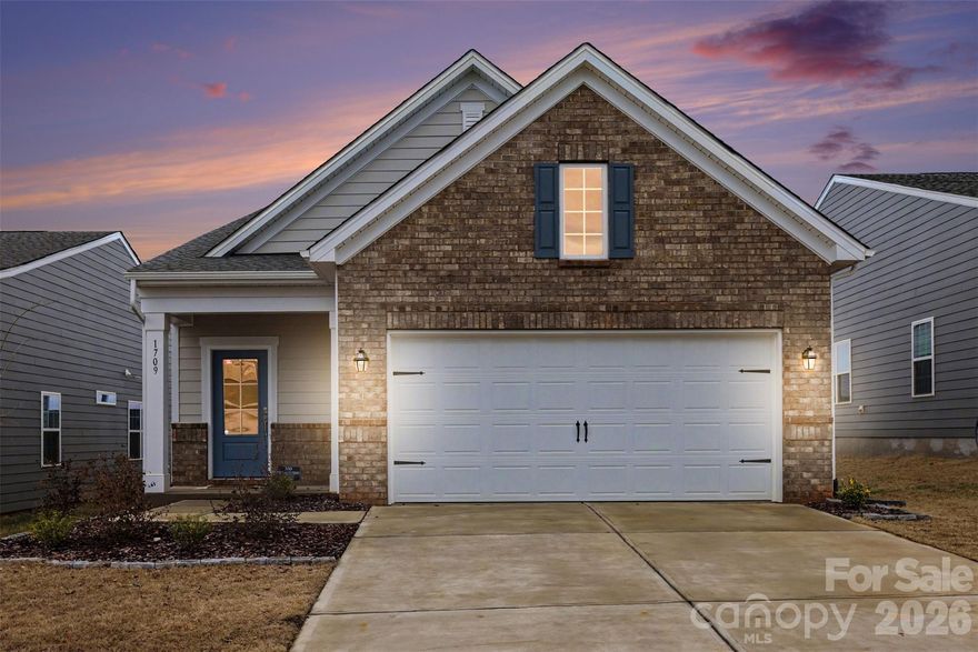 Just south of the North Carolina border, discover the vibrant Fort Mill lifestyle—known for highly rated schools, quick access to Charlotte, and year-round community events. Located in Fort Mill’s sought-after Elizabeth neighborhood, this move-in ready ranch offers easy, one-level living. The well-maintained home features 2 bedrooms, 2 full baths, and a dedicated office, along with updated light fixtures and ceiling fans throughout for added style and energy efficiency. Enjoy outdoor living in the beautifully landscaped backyard with open fencing that maintains a spacious, airy feel—perfect for relaxing, gardening, or entertaining. Residents will love the new 2-story clubhouse (under construction) with planned amenities including a fitness center, pool, pickleball courts, multi-use courts, pocket park, and walking trails—all within walking distance.