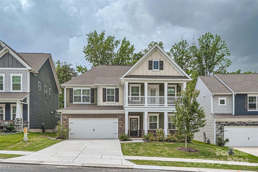 Isn't she lovely! Welcome! Come on in! As you enter and look to the right you will see a room perfect for an office or play room. Make your way towards the expansive kitchen, with abundant cabinets, quartz countertops, stainless appliances and a custom pantry. The great room boasts gorgeous lighting and an open floorplan. PLUS, there is a bedroom and full bathroom on the main floor! Upstairs you'll find the primary bedroom with custom built-in closets. All secondary bedrooms have access to spacious bathrooms! Enjoy Southern outdoor living with a rocking chair front porch perfect for coffee or a back patio to grill with friends! Tega Cay amenities as a resident include 10+ parks, beach & lake access for boats/kayak/canoes, tons of trails, tennis/pickleball, & more - welcome home!