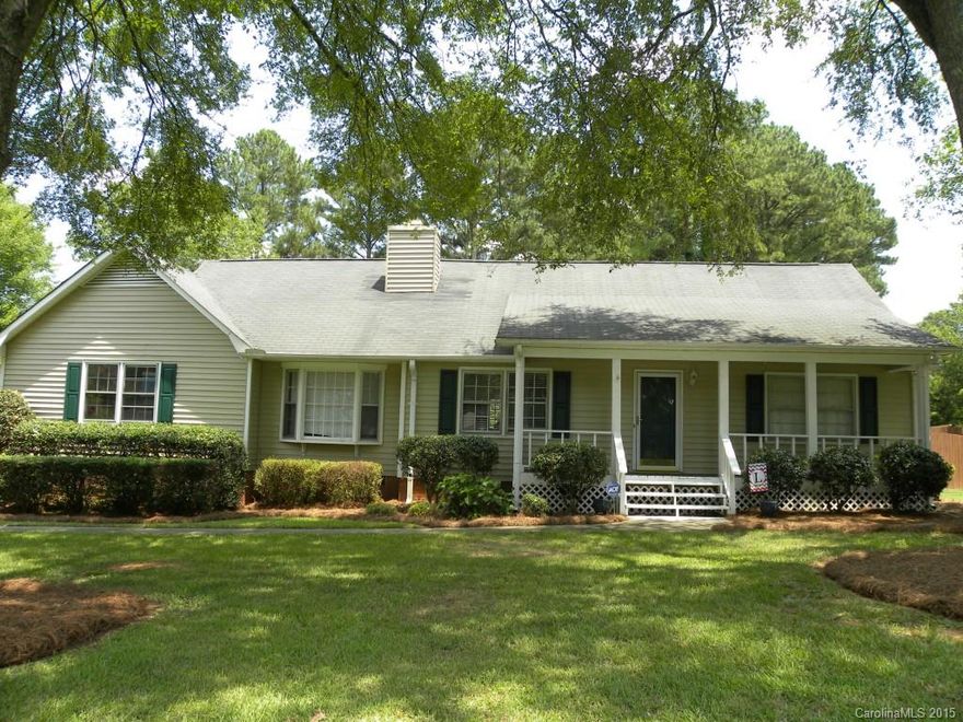 MOVE IN READY HOME, hardwoods throughout main level, open floor plan.  Two sided stacked stone fireplace in the family room/dining room. Updated kitchen with granite, tile backsplash and stainless steel appliances. Master on main with updated master bathroom and hardwood floors.  Secondary bathroom has been updated also.    Large lot with plenty of mature trees beautiful backyard with an in ground pool and grilling area.