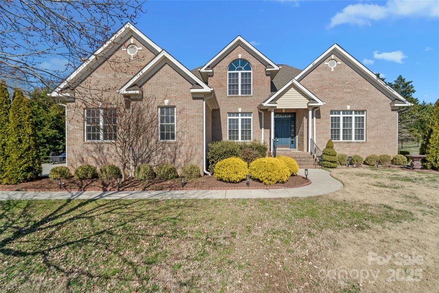 Situated on a spacious corner lot in Miller Pond, this beautifully designed ranch home offers an open floor plan with a bonus room over the attached side-load garage. The heart of the home is the well-appointed kitchen, featuring granite countertops, gas range, pantry, breakfast bar & generous dining area. A cozy fireplace adds warmth to the living room, while a separate dining room provides additional entertaining space. The main-level primary suite is a peaceful retreat with a tray ceiling, whirlpool tub, dual vanity, separate shower & walk-in closet. The dedicated office could serve as a 4th bedroom, though the septic is permitted for 3. Step outside to enjoy the expansive multi-level deck with a pergola, perfect for outdoor dining & relaxation. The backyard is fully fenced, with an additional private fence surrounding the sparkling inground pool—your own personal retreat! Conveniently located near shopping & dining!