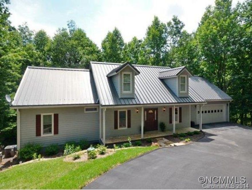 YOU WILL LOVE LIVING IN THIS PRISTINE HOME! An open floor plan,radiant heat, a dumb waiter, tank less water heaters, ktchs and laundries on both floors, two bonus rooms w/closets ,lower level FR, a storage/work shop and easy care landscaping reflect this home's CONVENIENCE AND FLEXIBILITY. Relax on the spacious deck lulled by a nearby babbling brook. Hike up to the Blue Ridge from a nearby trail or enjoy comm swimming,tennis & fishing amenities.