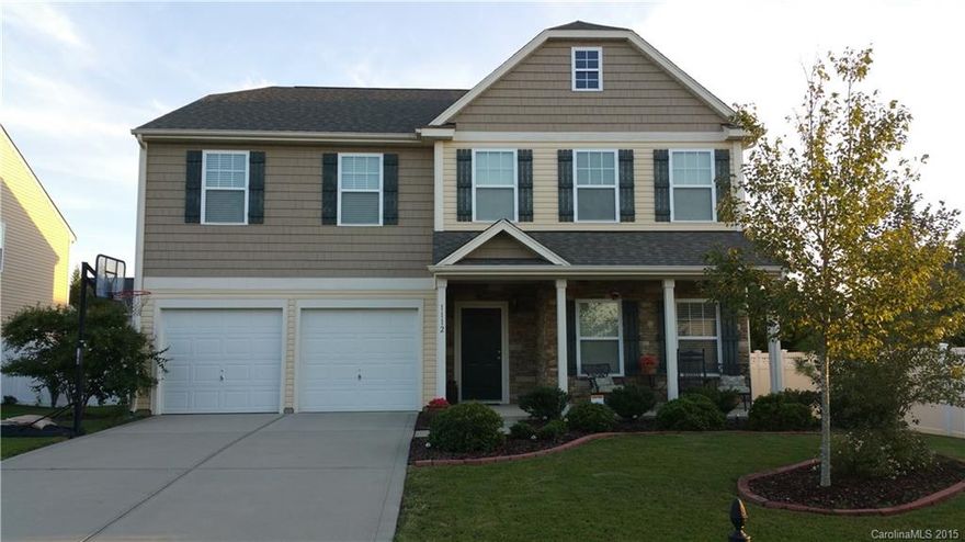 Beautiful 4 bedroom 2 and a half bathroom home in Ft. Mill SC.  Upgrades galore with granite countertops in both the kitchen and bathrooms, pre finished wood floors, stainless steel applicances, fenced in back yard, and a very open floor plan.