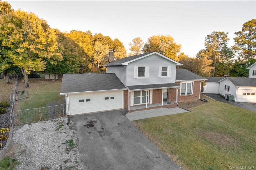 Wonderful home with just over 2000 sqft on .58 acres, new flooring throughout most of the home, fresh paint, roof only about 5 years old. Master down as well as a master upstairs. This home has alot to offer, Across the street from elementary school and just outside of city limits. Low taxes. You wont be disappointed. set up as master on main level and master upstairs.