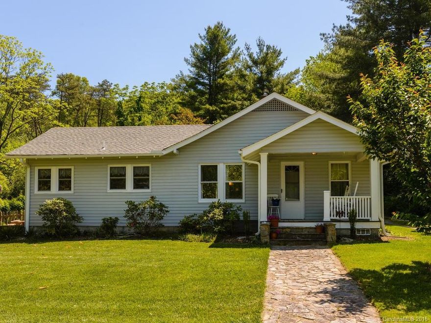 Fall in love with this adorable cottage, just off Main Street and only a few minutes from downtown Weaverville. With a separate guest house/ garage apartment, the opportunities are endless. Huge fenced in yard covers the span of both houses, cheerful patio on main house and wrap-around deck on guesthouse. Lovingly cared for, this 1920s bungalow has fresh paint and a newer master bathroom, split bedroom plan, and spacious living and dining areas. Guesthouse has a bonus room and large kitchen.