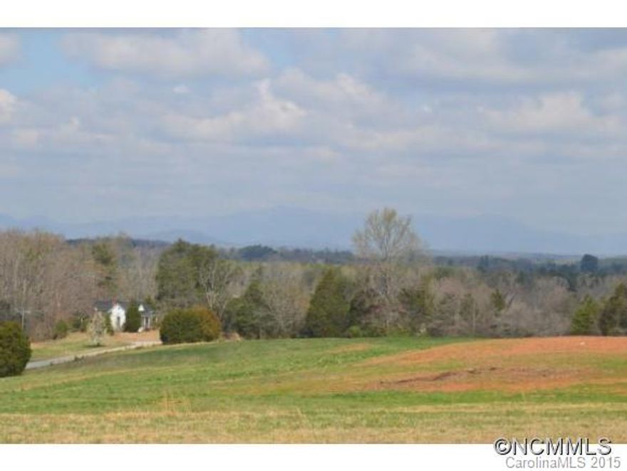 Fabulous mountain and pastoral views!  Mostly cleared rolling acreage, ready to create your farm or private estate. County water is available, plenty of paved road frontage and it can be subdivided.