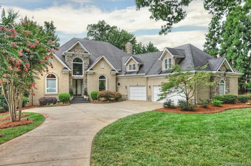 Unrivaled Peninsula location perfectly situated between the picturesque 9th fairway & shores of Lake Norman. Enjoy expansive water views & natural lighting from this open floor plan.Al fresco dining & relaxation await in the private loggia perched strategically to maximize the lakefront elements.3 car garage,master bedroom on main,updated kitchen & baths,walk up attic storage,private pier & boardwalk,meticulously maintained,stone & stucco exterior,full equity Peninsula Club membership available.