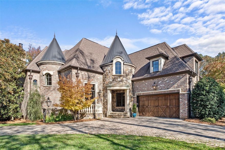 Beautiful custom home in private gated 7 home community - The Village At Tottenham. Main level features grand foyer, soaring ceilings, open floorplan, new hardwood floors. Great rm with stone fireplace and wall of windows. Chef’s kitchen with expansive island, custom cabinets with soft close lowers, marble countertops/backsplash, Dacor range, and Thermador convection ovens. Open to dining area/casual sitting room with fireplace. Primary BR on main-private retreat with door to rear patio and pool. Ensuite bath with 2 large vanities, marble shower, soaking tub, and a spacious custom walk-in closet next to laundry room! Plus 5th BR/Office. Upper level - 3 spacious bedrooms/ 3 ensuite baths plus a media/flex room. Outdoor features include covered terrace with open gas fireplace, built-in gas grill plus beautiful remote-controlled saltwater pool and hot tub. 2-car garage with keypad entry plus irrigation and landscape lighting. This home is a Must See!