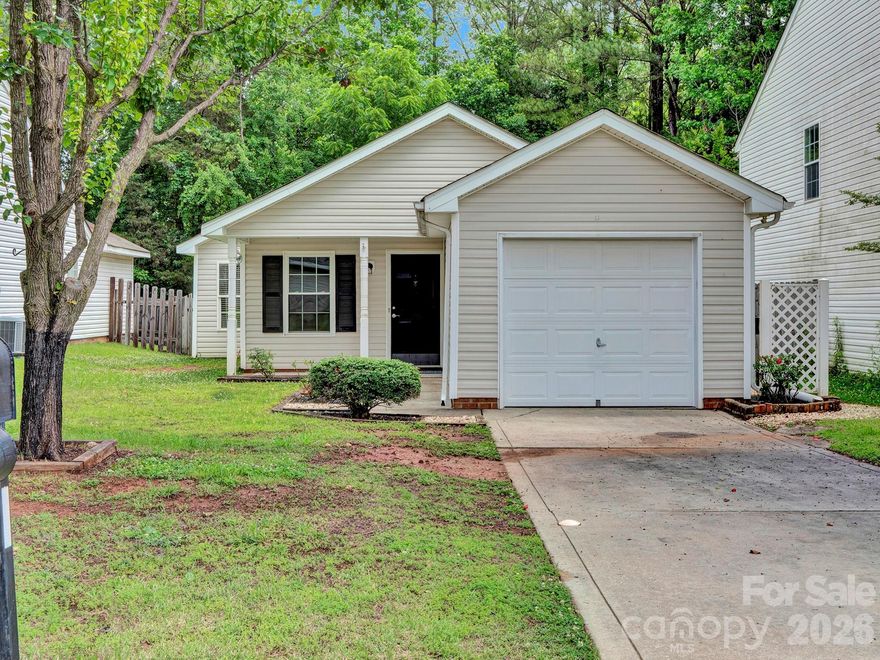 1170 Willet Way is a must-see. This inviting ranch home features a bright living area with cathedral ceilings that create a spacious, airy feel, flowing right into kitchen with a breakfast area. A spacious primary bedroom with ensuite and 2 secondary bedrooms that share a hall bath.  Attached garage with room for storage.
One of the best features of this property is the backyard. It is fully fenced and backs up directly to a quiet patch of woods, giving you a peaceful, private view with no neighbors immediately behind you. Located in a highly convenient part of Rock Hill, you’re just a short drive from local shopping, dining, and easy access to I-77.