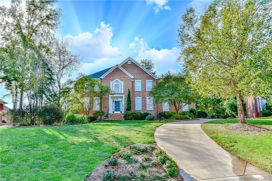 Renovated kitchen (2014) w/granite countertops, gas cooktop & butler’s pantry. Master suite has sitting area w/walk-in closet, plus bath w/separate tub/shower & his/her vanities. Great room w/vaulted ceiling & fireplace. 5th room can be bedroom or office. Excellent fenced backyard w/outdoor living area including covered deck w/hot tub, grilling area & patio with fire pit. Double garage. New roof (2015). New heat pump (downstairs 2014 & upstairs 2015). Great access to shopping, restaurants & I-77