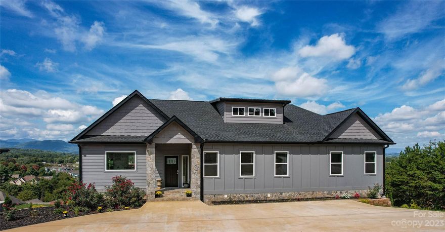 Welcome to Leicester Village, one of the most sought after subdivisions in the Asheville area, and this beautiful 4700 square foot home is the perfect example of what it means to live in Asheville to the fullest! The views start as soon as you pull into the driveway and continue on into every room. With a kitchen and living area on every floor allowing full privacy for your guests staying over.

Step outside onto one of the four massive porches and enjoy the 180 degree views. If you have any meetings downtown Asheville the short 15 min drive won’t leave you feeling stressed.