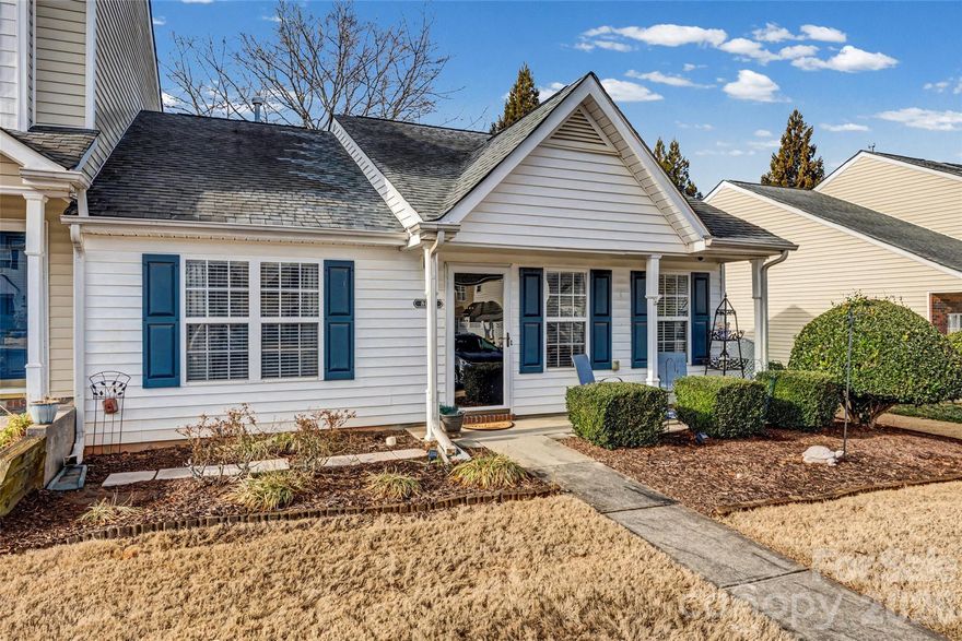 Welcome home to this beautifully updated Ranch END UNIT townhome in the highly desired Hanover Community in Indian Land! This 2-bedroom, 2-bath home features a renovated kitchen with butcher block countertops, quartz surfaces, stylish backsplash, and new laminate flooring that flows into the spacious family room. Vaulted ceilings in both the family room and primary suite enhance the spacious feel, while neutral tones and plentiful natural light create a bright, welcoming atmosphere. Step outside to a peaceful, private backyard with low-maintenance artificial turf or relax on the covered front porch. Enjoy unbeatable convenience with top-rated Indian Land schools, brand-new Costco and Target just across the street, plus shopping, dining, and quick access to the Ballantyne area. Make this beautiful townhome yours today! Washer, dryer and refrigerator will convey. Electric Fireplace and drapes will not convey.