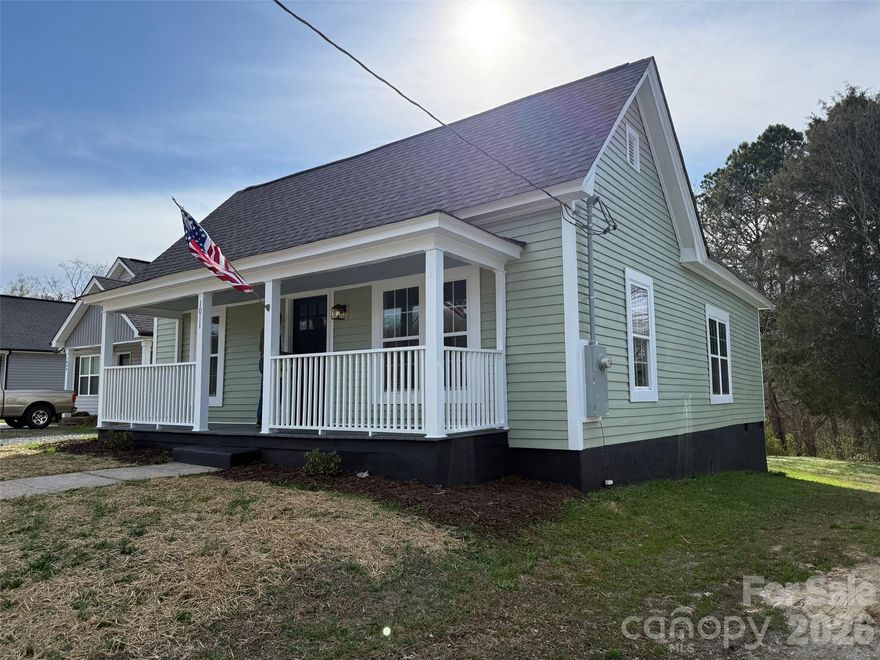 Adorable circa 1901 cottage.  Remodeled for today's lifestyle.  New architectural shingle roof, electric, and plumbing.  New flooring and carpets in the bedrooms.  New windows throughout.  2 full bathrooms and two bedrooms.  Combo Kitchen and dining area. Large 17x13.7 living room.  Nice granite countertops over white cabinets.  Deck off the rear of the home and an older carport behind the home could be used for small cars, or easily converted into a covered rear patio area.  Deep back yard, partially sloped.  Older storage shed in the rear of the yard.  Ten blocks to Spencer, which is undergoing a fantastic resurgence of activity with a new public park and restaurants, a small grocery store, and so much more.  Spencer is home to the North Carolina Transportation Museum and the North Carolina Museum of Dolls ,Toys and Miniatures.