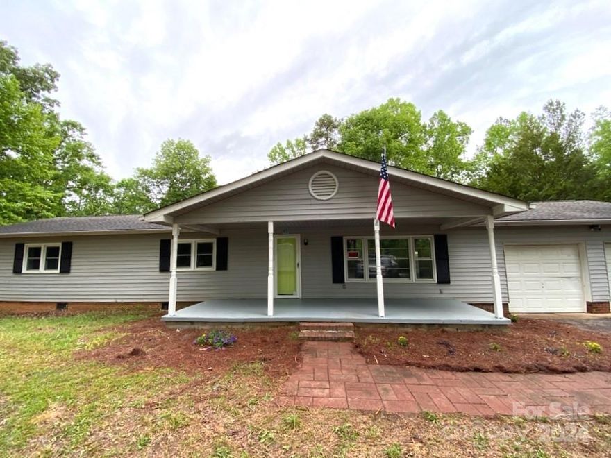 If you love the country life, check out this 1400+ square foot home on 3.5+/- acres that features the following renovations.  New roof, new vinyl plank flooring, fresh paint, granite countertop at bar/island, new back deck, new hvac system and new appliances. This home is a 1974 manufactured home that was added onto years ago with a double attached garage. Title to home will be transferred to new buyer at closing.