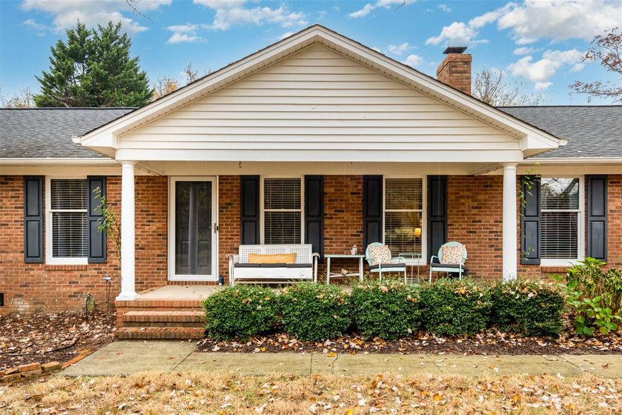 This stunning, all brick, ranch home sits on half an acre with a spacious backyard and screened in patio. It's minutes from uptown Charlotte with tons of shopping and restaurants nearby! Upon entering, the home boasts a cozy living room with beautiful flooring, an all brick fireplace and a kitchen with unique light fixtures and upgraded appliances. It has three bedrooms and two bathrooms with newly updated panel style doors on all bedroom, bathroom and closet doors. The beautiful owner's suite features shiplap walls and a sliding farmhouse door to the bathroom. You'll find a gorgeous sunroom off the kitchen looking out into a scenic backyard. The home has a brand new 2024 hvac and brand new hot water heater!