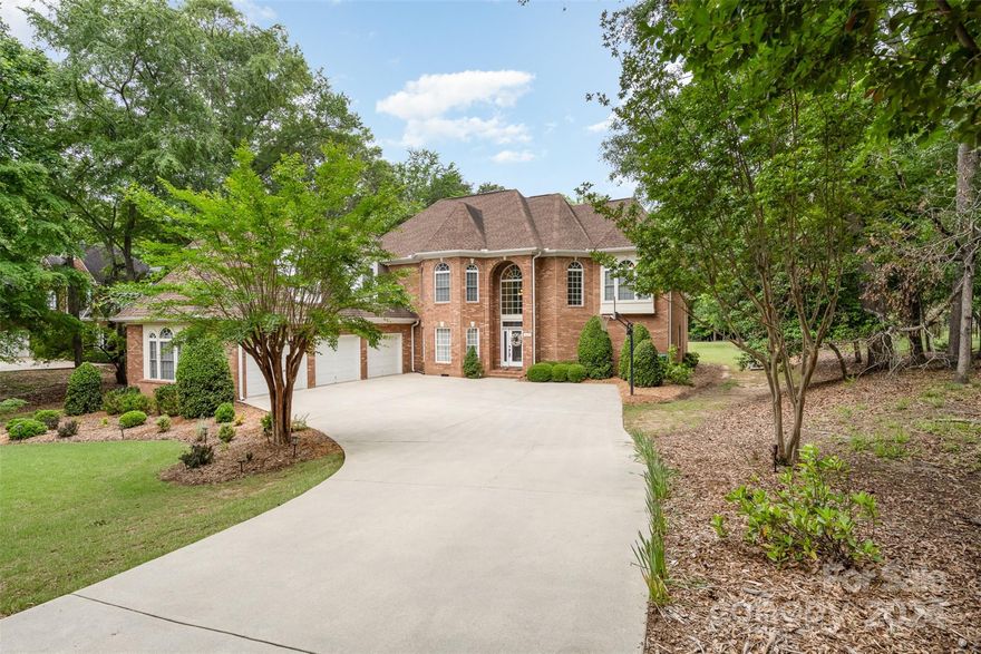 $1500 lender credit! Seller offering $10,000 credit to buyer if closed by 7/19/24! Introducing an exquisite addition to the esteemed Better Homes and Gardens Distinctive Collection. This captivating 5 bedroom, 4.5 bathroom residence, nestled on over 0.77 acres in the coveted Carolina Country Club community, awaits its discerning new owner. Stepping into this luxurious abode, you're immediately greeted by a grand entrance, setting the tone for the remarkable experience that follows. The heart of the home is its chef-inspired kitchen, boasting an expansive island and outfitted with premier Wolf/Sub-Zero appliances, ensuring unparalleled culinary experiences. Elevating outdoor living, the residence seamlessly transitions to a screened-in porch, perfect for unwinding or entertaining, complete with an outdoor kitchen for alfresco dining enthusiasts. The centerpiece of the meticulously landscaped backyard is an oversized saltwater pool, offering a private oasis for relaxation and recreation.