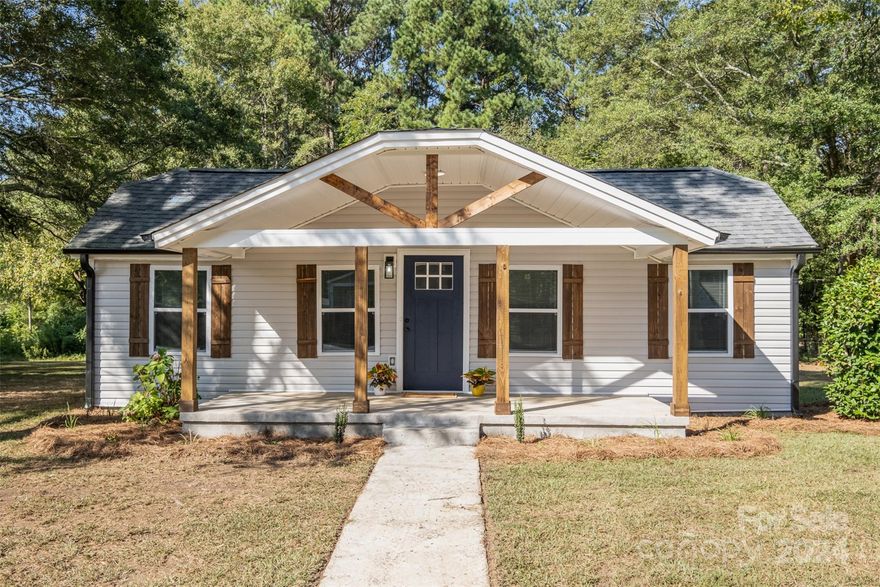 **Back on the market due to no fault of the seller.**

Charming Renovated Ranch Bungalow – No HOA! This beautifully updated 3-bed, 2-bath home is located on a quiet street just minutes from I-85 in Dallas, NC. Featuring an open floor plan, freshly painted walls, luxury vinyl plank flooring, brand-new windows, a new A/C unit, and vinyl siding, this home is move-in ready! The kitchen offers sleek quartz countertops, stainless steel appliances, and plenty of cabinet space. The primary suite includes an en-suite bath with a stylish walk-in shower, while two additional bedrooms provide comfort and space. Enjoy the flat, private backyard, perfect for outdoor gatherings or relaxation. Schedule your tour today!