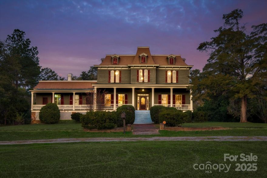 Walk into the past in this gloriously maintained Victorian home! Gleaming hardwood floors and soaring ceilings greet you with the original moldings, doors, hardware, and windows! Historic paint colors bring this victorian home back to life. Enjoy a large lot (4.63 acres) offering you a variety of options to garden and enjoy our beautiful southern weather! Current owners have done extensive updates to the home, including plumbing (including a Halo system), the electrical, the kitchen, the bathrooms, exterior & interior paint, and the roof has been coated. The home is complete with a Vivent alarm system, which includes four outside cameras as well as glass break detection sensors on inside windows. A new Starlink internet system has also been recently added. 2 metal outbuildings, (each measuring 18'x20') have recently been added to the backyard. The expansive back yard is fully fenced, including a fully fenced inner yard that leads directly to the back porch. A lighted, temperature controlled, detached work shop perfect for projects or hobbies, also sits on the property. The crawl space has been converted into a climate controlled storage area. With 2 bedrooms and 2 bathrooms downstairs and 4 upstairs, this home would make an ideal B&B! Each bedroom is complete with their own ensuite bath. The 4 bedrooms upstairs have individual mini split units giving each occupant their control over room temperature! The downstairs rooms, including a parlor, office, formal dining room, and living room are all climate controlled by three separate units. This beautiful home in the heart of historic downtown Edgefield, is only 3 short blocks from the town square which includes multiple dining and shopping experiences. This remarkable home has so much to offer, including a formal dining room, living room, and parlor. Come walk into a bygone era and begin the next chapter of your life!