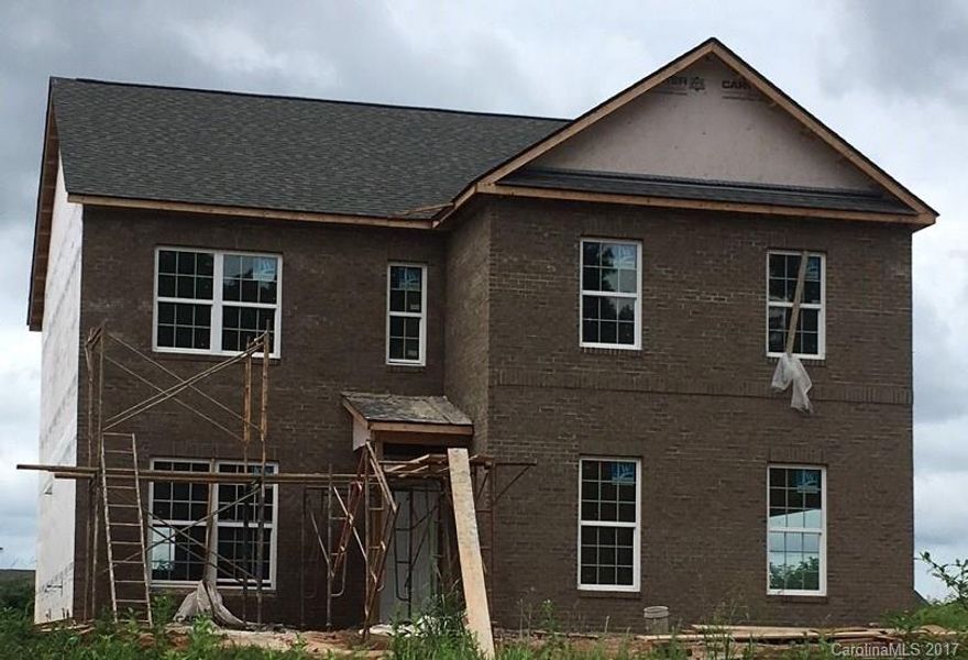 UNDER CONSTRUCTION! Estimated Completion Sep '17! Beautiful 2-Story Home featuring Side-Load Garage, 4 Bedrooms & 3 Baths. Guest Suite on Main! Hardwood floors in Foyer, Dining, Kitchen, Breakfast, & Pantry. Great Room with Gas-Log Fireplace convenient to Granite Kitchen with beautiful Dark Cabinets & Stainless Steel Appliances--including Gas Range. Spacious upper level with 3 Bedrooms all with Walk-In Closets including Master Bedroom, Laundry Room & Loft area. Vinyl Baths. 15x15 Concrete Patio.