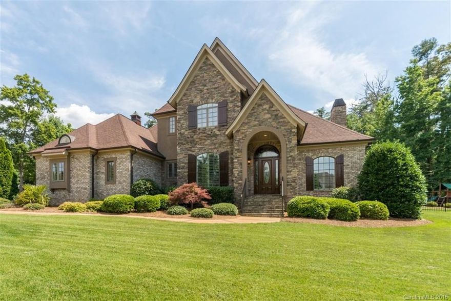 Stunning brick home with stone on large lot with tons of privacy in Sunset Ridge. Convenient and quiet detached home office. Formal living room with fireplace has warm built-ins. Formal dining with picture frame mouldings. Enjoy the soaring ceilings and roaring fireplace in the spacious family room. Stainless and granite in the kitchen. Master on main with his and her closets. In-ground pool. Great backyard. Low SC taxes and award-winning Clover schools.