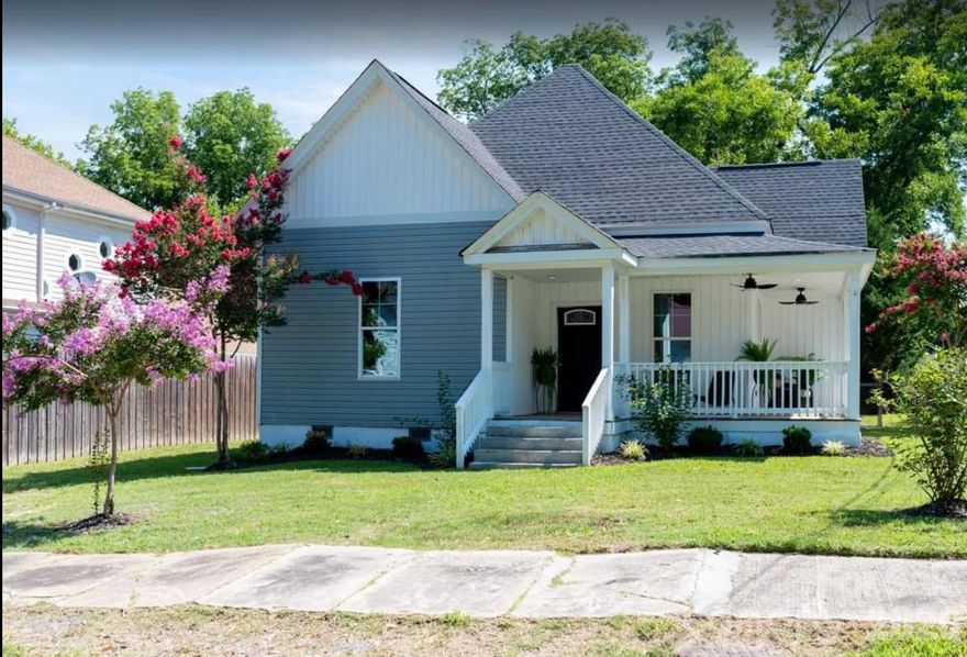 Completely remodeled 3-bedroom, 2-bath cottage-style home featuring soaring 11-foot ceilings throughout and enormous room sizes perfect for all your large furniture. Relax on the inviting covered front porch with a charming side wraparound, or entertain guests inside on the pristine original hardwood floors that add warmth and character throughout the home. The spacious living room offers recessed lighting and a ceiling fan for year-round comfort. The beautifully updated kitchen showcases cherry cabinetry, Quartz countertops, soft-close cabinets, and a large walk-in pantry. Host memorable gatherings in the formal dining room designed for entertaining. The generous primary suite includes recessed lighting and a stunning en-suite bath with a ceramic tile shower featuring built-ins, double vanity, and a walk-in closet. A tankless water heater ensures long, relaxing showers anytime. Major updates include electrical, plumbing, roof, doors, fixtures, and windows — giving you peace of mind for years to come. Neutral paint throughout provides a fresh, move-in-ready feel. Step outside to enjoy grilling on the side deck just off the mudroom, overlooking a private backyard perfect for play, pets, or relaxation. Conveniently located just minutes from shopping and an easy drive to both Charlotte and Columbia in the growing town of Chester.

This beautifully updated cottage offers charm, space, and modern convenience — all in one incredible home.