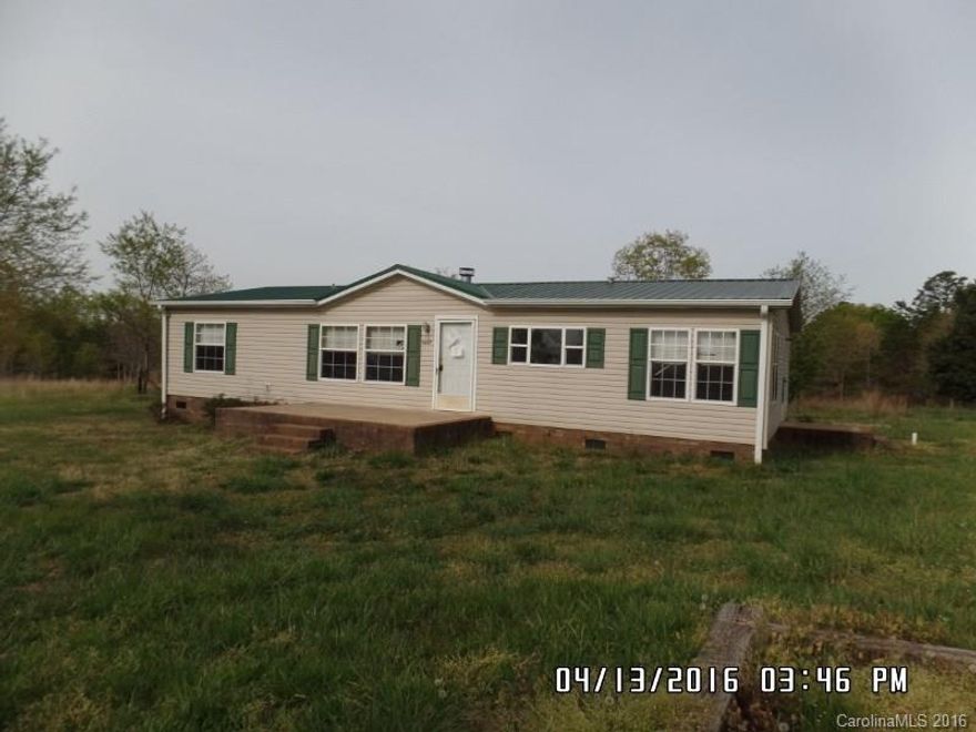 Three bedroom, two bath doublewide mobile home in western Lincoln County on 2.4 acre lot. Property appears to have been fenced at one time.  Financeable condition in great rural location near Cleveland, Gaston and Lincoln County boundaries.