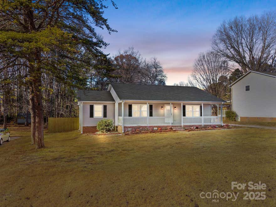 Back on the market at no fault of the seller with a PRICE IMPROVEMENT! 

Welcome home to this beautiful 3-bedroom, 2-bath residence nestled on a quiet street just minutes from town. Offering 1,472 square feet of thoughtfully updated living space, this home features two freshly renovated bathrooms, including a private en suite in the primary bedroom. The upgraded kitchen boasts modern appliances and elegant quartz countertops, making it both functional and stylish.
Enjoy year-round relaxation in the beautiful sunroom, providing versatile additional living space filled with natural light. The home has been freshly painted and features updated flooring throughout, creating a clean and inviting feel. A spacious laundry area adds extra convenience and storage.
Outside, you’ll find a large wooded backyard perfect for privacy and outdoor enjoyment, along with a flat front yard offering plenty of room for kids to play. The home also features a new roof and new water heater, and the HVAC system has just been serviced, offering added peace of mind to the next owner.
This move-in-ready home combines comfort, updates, and an ideal location—perfect for everyday living and entertaining alike, all at a price point that is hard to beat in today’s market.