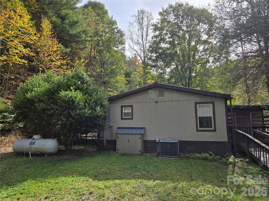 This unique property is back on the market! The buyer changed their mind, so it is due to no fault of the seller or the property. The appeal of this property is a 1056 sq ft home on 2 unrestricted acres AND only 3 miles from Interstate 40!! Amenities include a large house pad area for a future garage, 2 outbuildings (18'x18' and 14'x40' with power), front covered porch, and large back deck. The home has a 2-bedroom septic but has a bonus room for an office or other use. Seek out your own serenity! Call today.