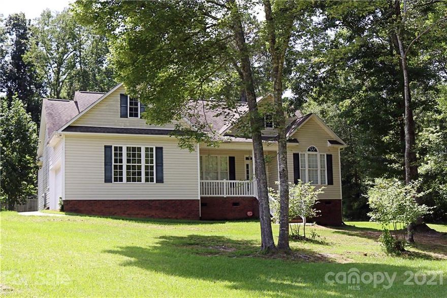 This rare pristine custom build one owner ranch in Lancaster, S.C. is situated on over 1 acre of wooded land offering wooded views. You will love knowing this customized home offers both vaulted & trey ceilings up to 19ft, true Oak hardwood floors and Hard Maple Cabinetry. This attention to detailed and construction continues throughout the home. This home also offers an oversized laundry room, floored attic space, a two car side loading garage, screened back porch & an oversized covered front porch. Allowing for a total of 1948 Sqft to included headed and unheated sq ft. This home is located within the prestigious Lancaster SC school district and is walking distance to the updated Buford Recreation Center.