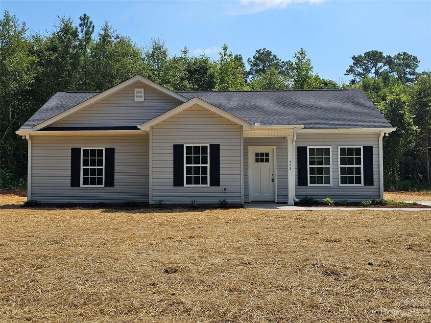 New construction home.  Has 3 bedrooms 2 full baths.  Home is on 1.38 acres.  Large kitchen has stainless steel appliances including refrigerator, sliding glass doors opening to the back yard.
