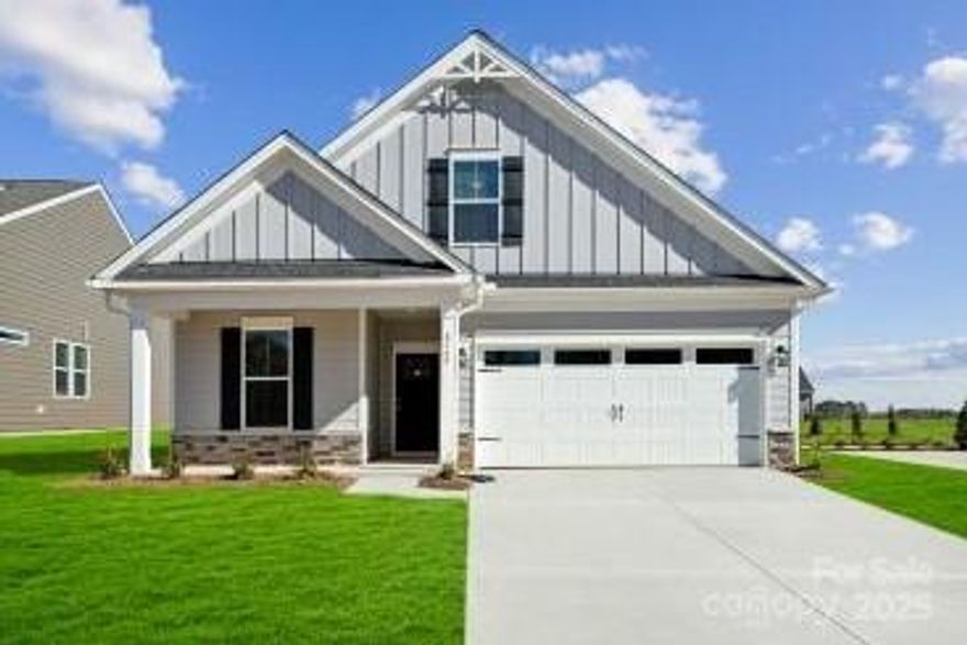 55+ Community! New Construction. Step into this 2,025 square foot haven where convenience meets charm, just a stone's throw from the scenic Lake Norman. The main floor features a luxurious primary suite complete with a serene garden tub, offering the perfect place to unwind. Upstairs, you'll find two cozy guest bedrooms sharing a well-appointed bath, ideal for family or visiting friends. Imagine sipping your morning coffee on the charming rocking chair front porch, or enjoying the tranquility of a screened back porch that opens up to beautifully landscaped buffer zones. With lawn maintenance included, you can spend more time indulging in the outdoor lifestyle this home offers. Could this be the perfect sanctuary for your next chapter?