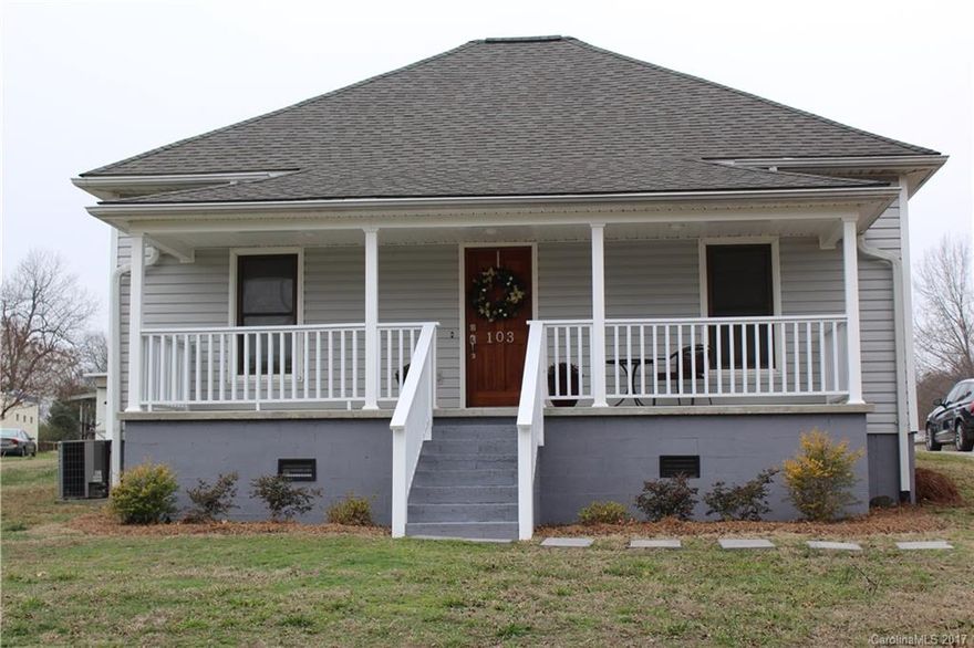 Spacious well kept home with very large living room! This home offers 4 bedrooms and 3 full bath rooms! Beautiful custom fireplace in living room. Very  large dining room!  This home has a lot to offer!  Attached 2 car garage, cute storage building and convenient location!