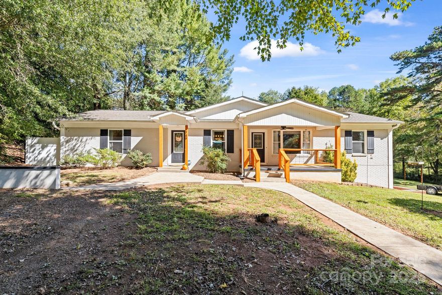 Well maintained Brick ranch home with basement on 2.76 Acres. A beautiful property with space for a small pasture that already has several garden beds, chicken coop (3 chickens Stay), Fruit trees/bushes, covered wood shack, storage shed that has also been designed to collect rain water, perfectly hidden from the main home, divided by a small stream and row of trees.  Ample parking w/ horse shoe driveway, Finished walk-out basement currently used as a second living space with bar area, half bath, and a room used for storage but could be used as a 4th bedroom plus an office area but not heated or cooled.  Backyard is fenced with firepit and a back deck made from Trex Decking boards for longevity,  walk out of basement to a concrete patio giving you plenty of options for outdoor living spaces. Home has designated Generator hook up and a radon mitigation system installed in 2017. This home has so many great qualities and updates all while being conveniently located right out side of the town of Taylorsville.